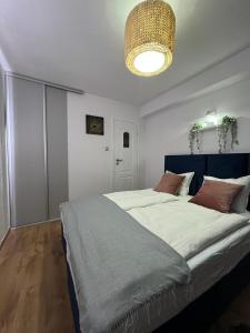 Posteľ alebo postele v izbe v ubytovaní S&M Villa Kolobrzeg