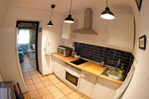 Kuchyň nebo kuchyňský kout v ubytování Apartamento tranquilo e ideal para parejas, con bonitas vistas de Toledo y fantàstica ubicación