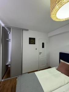 Posteľ alebo postele v izbe v ubytovaní S&M Villa Kolobrzeg