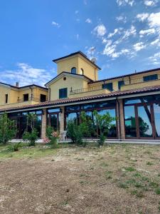 a large building with a lot of windows at Torre del Gallo in Ripatransone