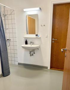Ett badrum på Hos Martin - Bed and Tee Kitchen - Kontaktløst - Contactless