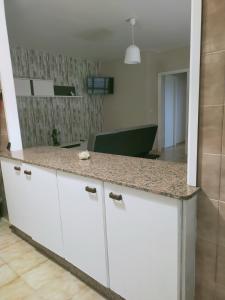 Kuchyň nebo kuchyňský kout v ubytování CASA PORTELA APARTAMENTOS