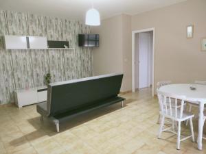 TV a/nebo společenská místnost v ubytování CASA PORTELA APARTAMENTOS