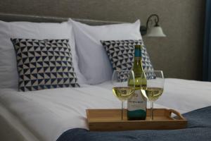 Łóżko lub łóżka w pokoju w obiekcie Apartament Żeromskiego 17 - Insel Apartamenty