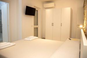 Posteľ alebo postele v izbe v ubytovaní Casa di Gio