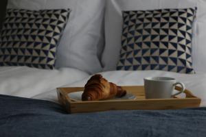 Łóżko lub łóżka w pokoju w obiekcie Apartament Żeromskiego 17 - Insel Apartamenty