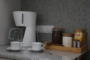 Zestaw do parzenia kawy i herbaty w obiekcie Apartament Żeromskiego 17 - Insel Apartamenty