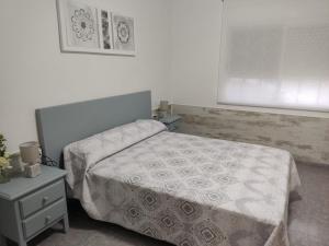 Posteľ alebo postele v izbe v ubytovaní Apartament Cristina