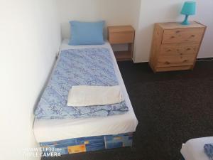 Posteľ alebo postele v izbe v ubytovaní Penzion U Hladů
