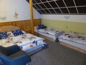 Postel nebo postele na pokoji v ubytování Apartmány Plischke