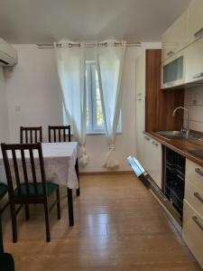 Kuchyň nebo kuchyňský kout v ubytování Apartments Matej & Irena