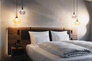 Voodi või voodid majutusasutuse Scheiblhofer The Resort toas