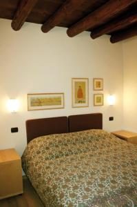 Postel nebo postele na pokoji v ubytování Agriturismo Nicobresaola
