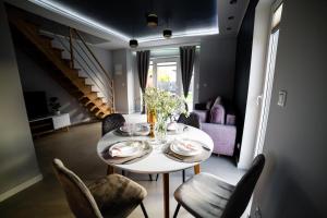Posedenie v ubytovaní CHILL HAUS APARTAMENTY , Domki