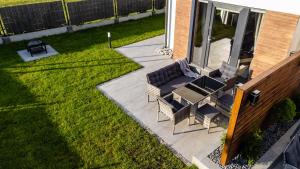 Vonkajšia záhrada v ubytovaní CHILL HAUS APARTAMENTY , Domki