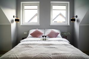 Posteľ alebo postele v izbe v ubytovaní CHILL HAUS APARTAMENTY , Domki