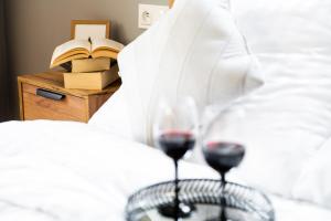 Posteľ alebo postele v izbe v ubytovaní CHILL HAUS APARTAMENTY , Domki