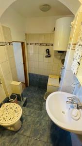 Kúpeľňa v ubytovaní Apartment Dreamy + 7 fotografií