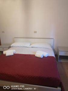 En eller flere senger på et rom på Mulini di Verrucole