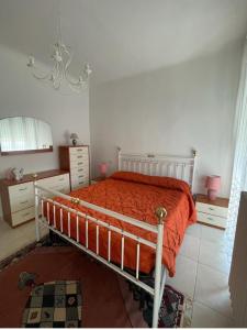 Ένα ή περισσότερα κρεβάτια σε δωμάτιο στο PALAZZINA ANDREA