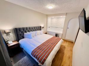 Postel nebo postele na pokoji v ubytování Casona Plaza Hotel Cusco