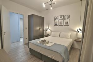 a bedroom with a bed with a tray on it at Feel Athens Studios at Monastiraki in Athens