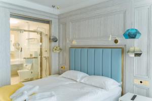 Letto o letti in una camera di Hotel Maris
