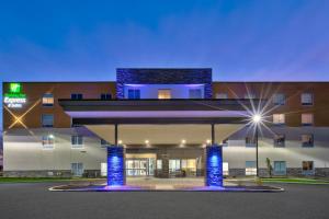 a rendering of a hospital building at night at Holiday Inn Express & Suites Wooster by IHG in Wooster