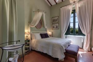 Postel nebo postele na pokoji v ubytování La Striscia Wine Resort + 37 fotografií