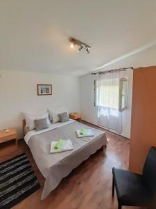 Postel nebo postele na pokoji v ubytování Sunshine Apartment