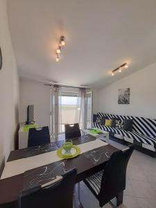 Posezení v ubytování Sunshine Apartment