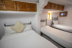 Postel nebo postele na pokoji v ubytování Fes Hostel Home