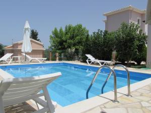 Bazén v ubytování Harmony Villas nebo v jeho okolí