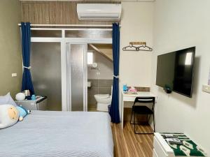 Un ou plusieurs lits dans un hébergement de l'établissement ShinYuan BNB