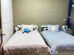 Un ou plusieurs lits dans un hébergement de l'établissement ShinYuan BNB