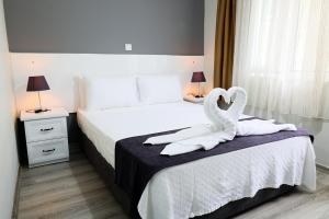 Canada Hotel & Bungalows客房内的一张或多张床位