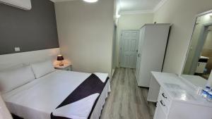 Canada Hotel & Bungalows客房内的一张或多张床位