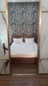 Ένα ή περισσότερα κρεβάτια σε δωμάτιο στο Apartment studio with good view