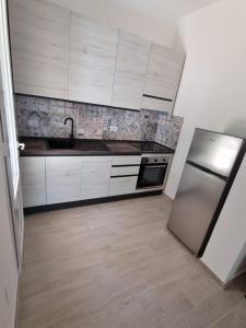 Kuchyň nebo kuchyňský kout v ubytování Villa Edoardo con pineta a 250 metri dal mare
