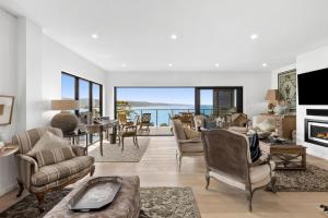 a living room with a view of the ocean at Oceania 11 in Lorne