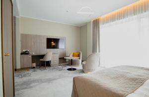 Postel nebo postele na pokoji v ubytování Mineral SPA Draugystė