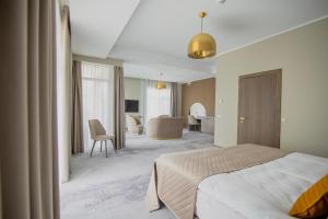 Postel nebo postele na pokoji v ubytování Mineral SPA Draugystė