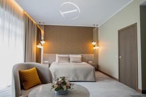 Postel nebo postele na pokoji v ubytování Mineral SPA Draugystė