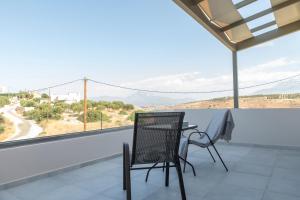 Balkón nebo terasa v ubytování AEONIOS LUXURY VILLA