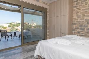 Balkón nebo terasa v ubytování AEONIOS LUXURY VILLA