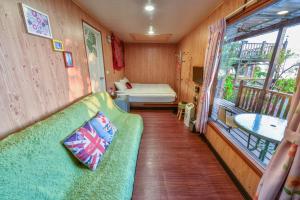 Voodi või voodid majutusasutuse Home Box toas
