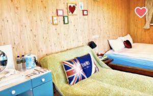 Voodi või voodid majutusasutuse Home Box toas