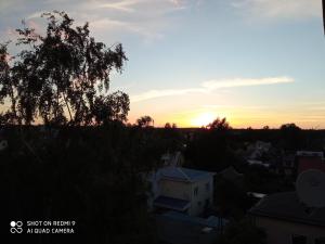 a sunset from the roof of a building at Narva mnt 23``` in Jõhvi