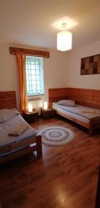 Postel nebo postele na pokoji v ubytování Gościniec Janowa Góra - Agroturystyka + 37 fotografií