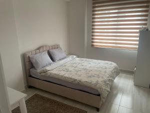 Postel nebo postele na pokoji v ubytování Sky hill luxury apartments + 6 fotografií